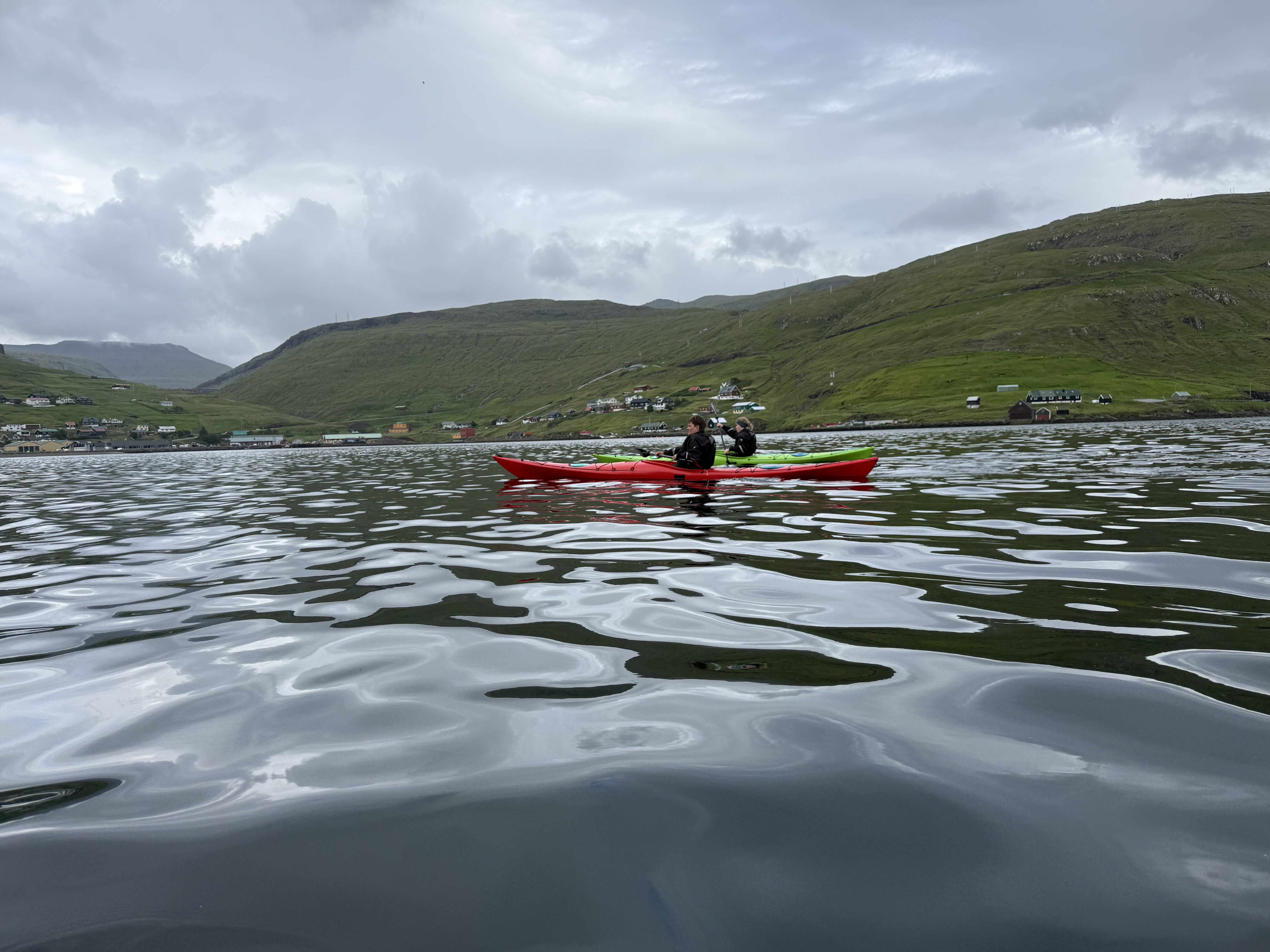 Kayakers on fjord